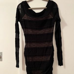 BCBG sexy black fitted dress with lace detail.